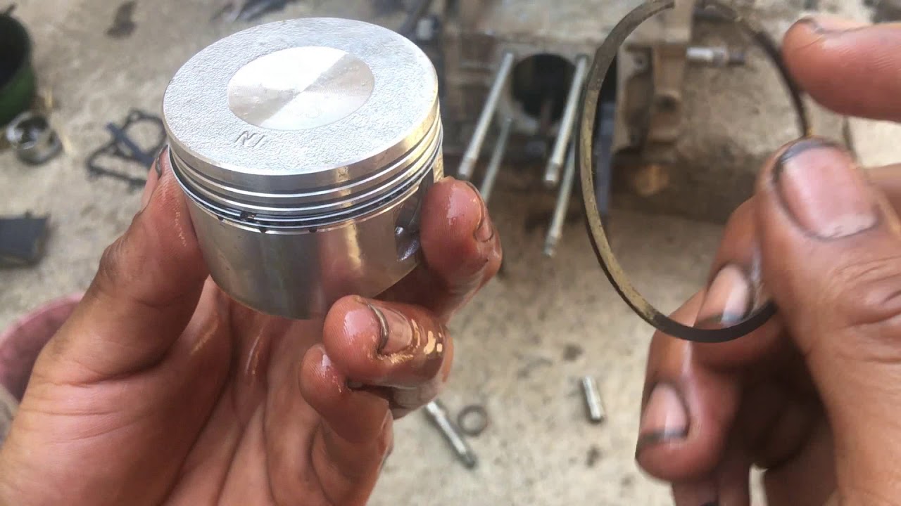 Como cambiar cilindro y piston de moto 150