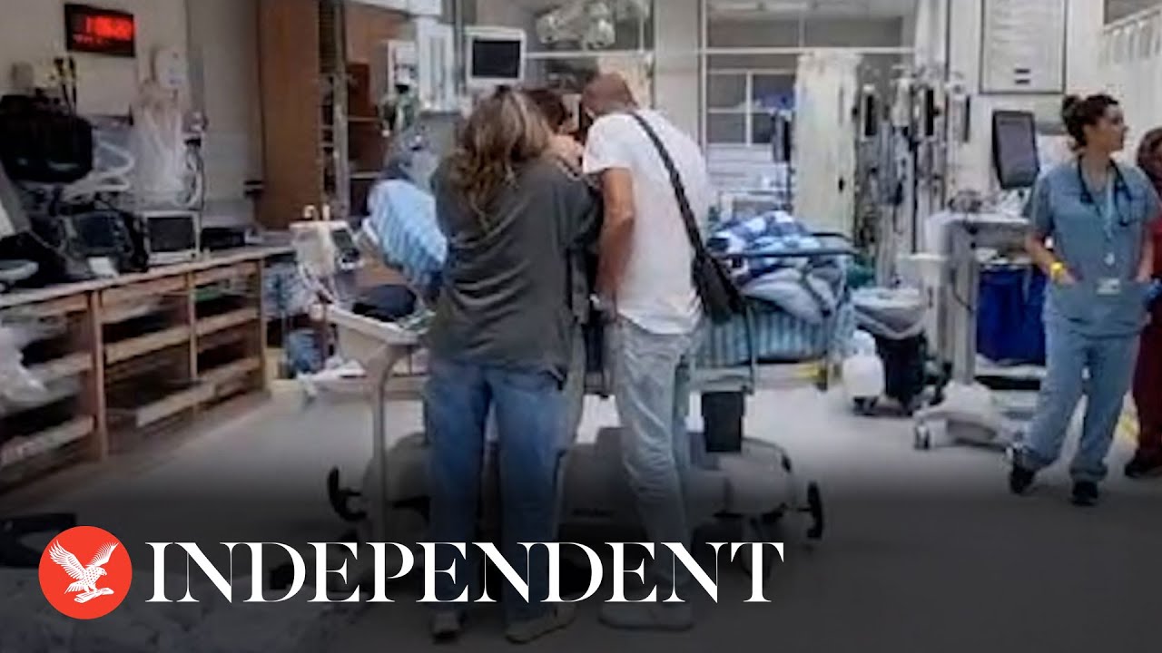 Moment 21-year-old hostage kidnapped from music festival reunites with family after release