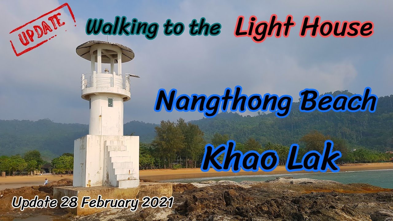 Walking to the Light house at Nangthong Beach, Khao Lak Thailand