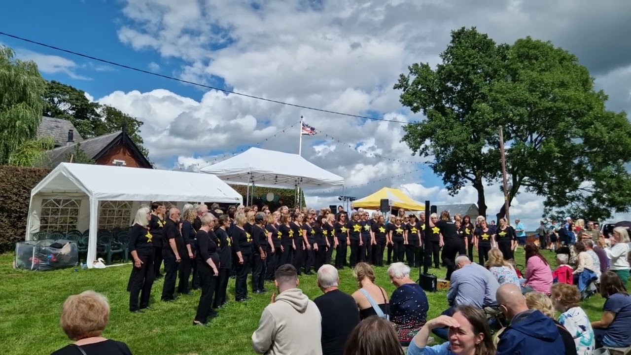 Knutsford Rock Choir sing Never Met You Yet at Redesmere