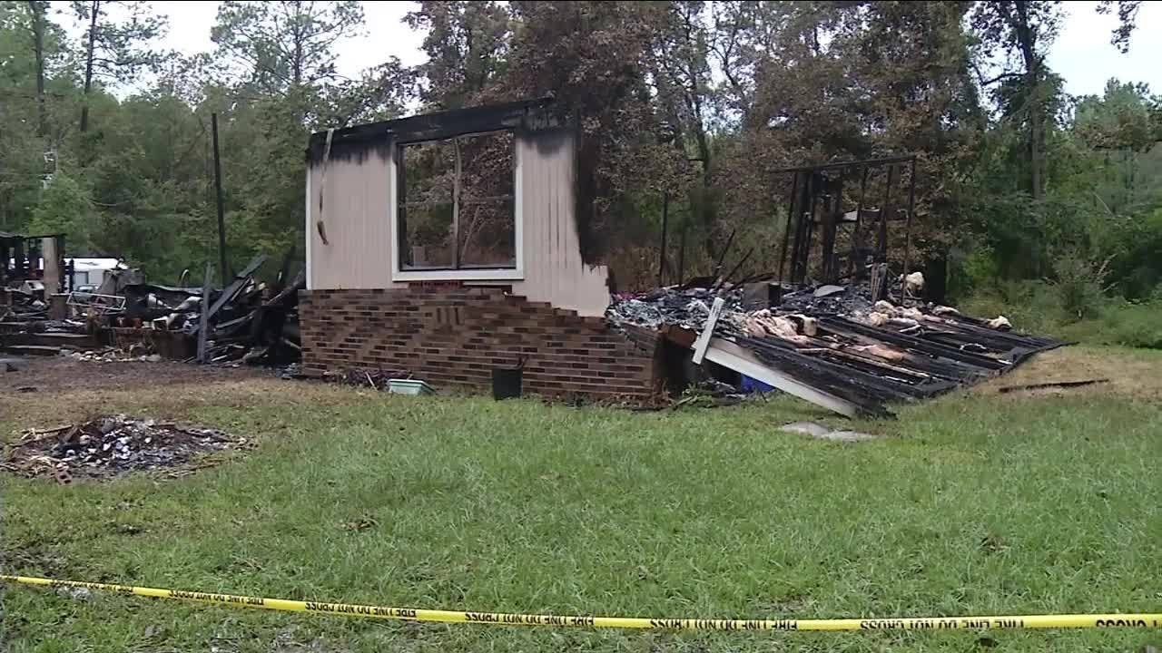 Candle starts fire that kills woman and child