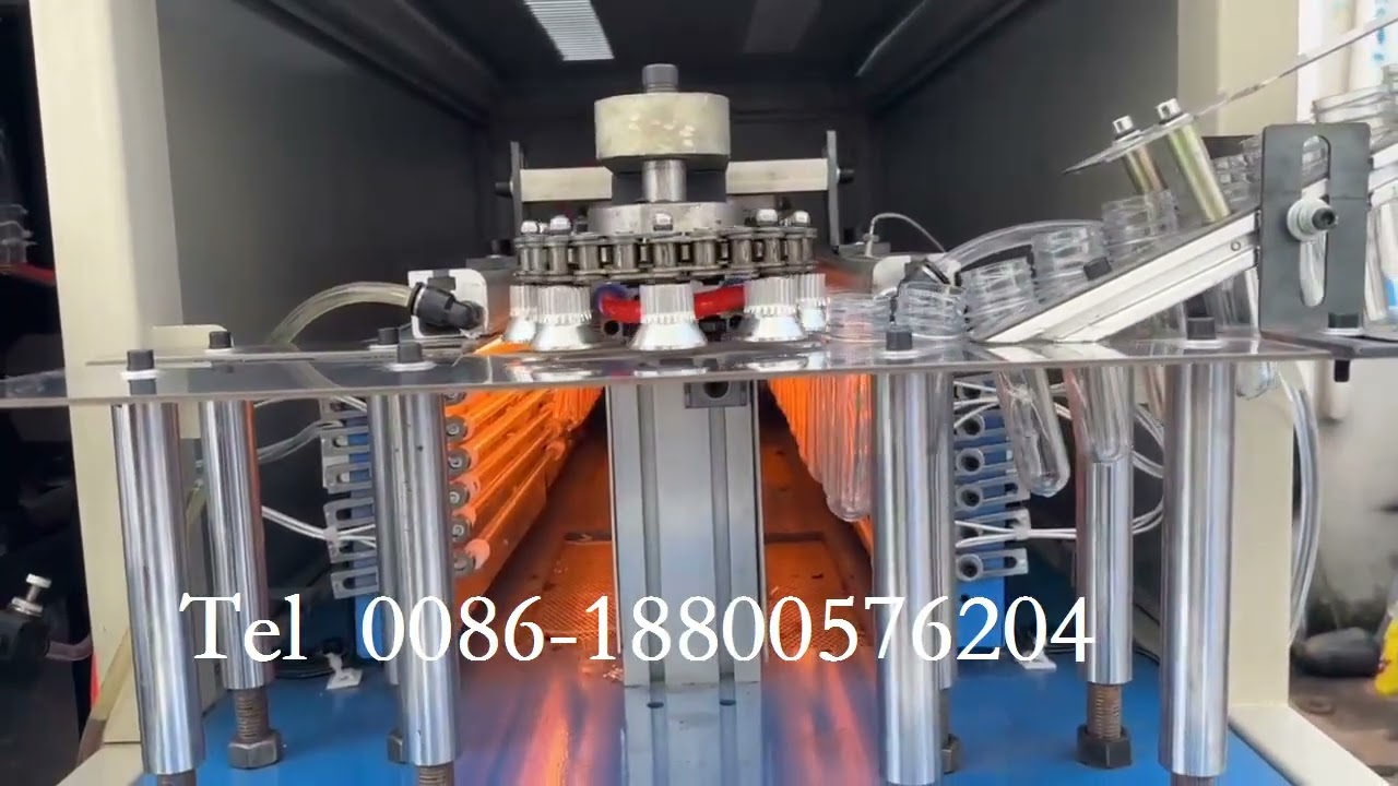 Semi automatic 4 cavities PET bottle blowing machine