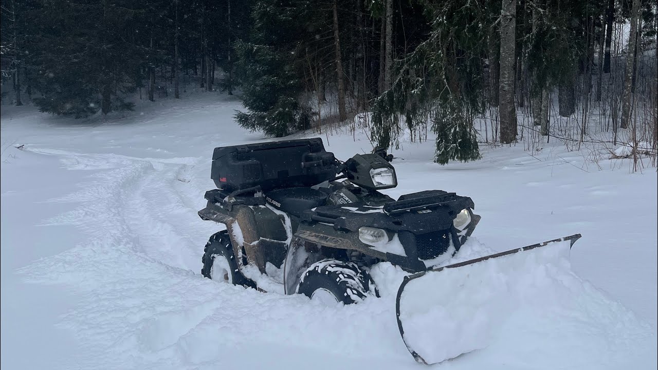 snow plowing with a atv