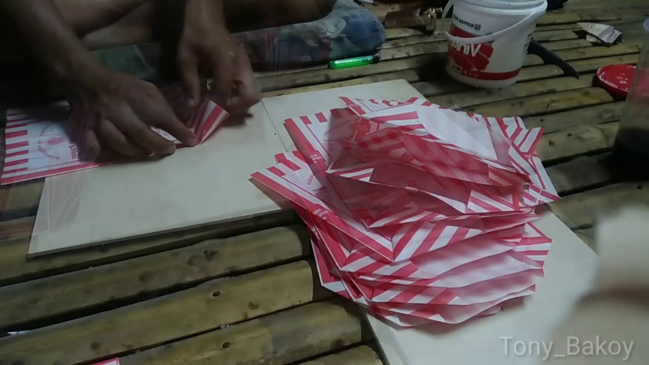 cara melipat kertas kemasan gorengan dll