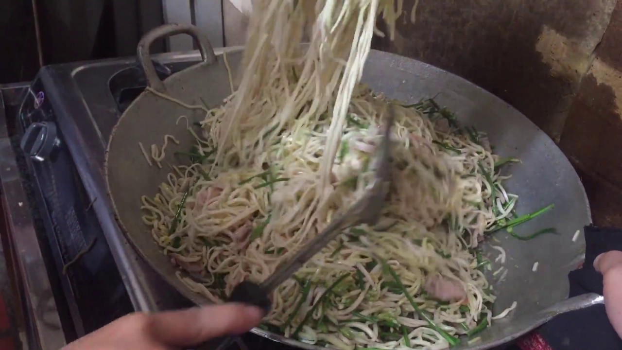 Cambodian family food, Fried noodle with pork, dried shrimp&saquid, beansprouts and garlic scapes