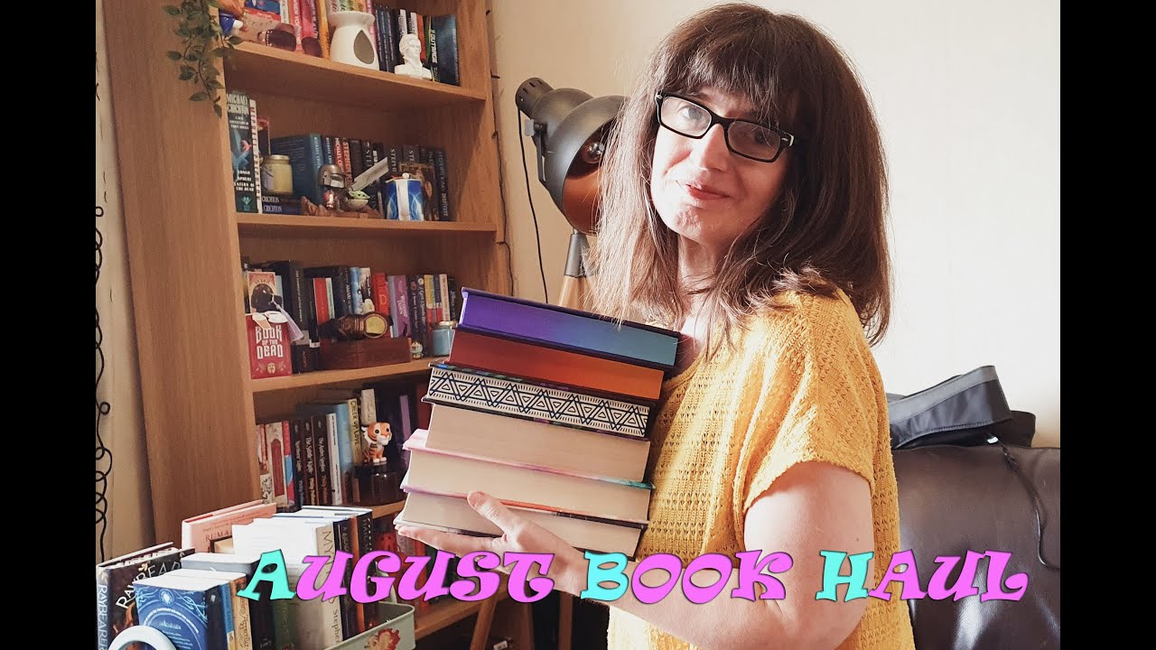 August Book haul -  plus Illuminate Raybearer unboxing