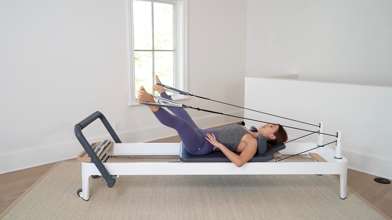 Pilates Reformer Feet in Straps