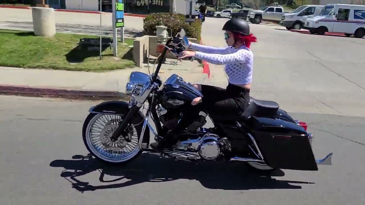 Elli struts the 2014 Roadking down front st