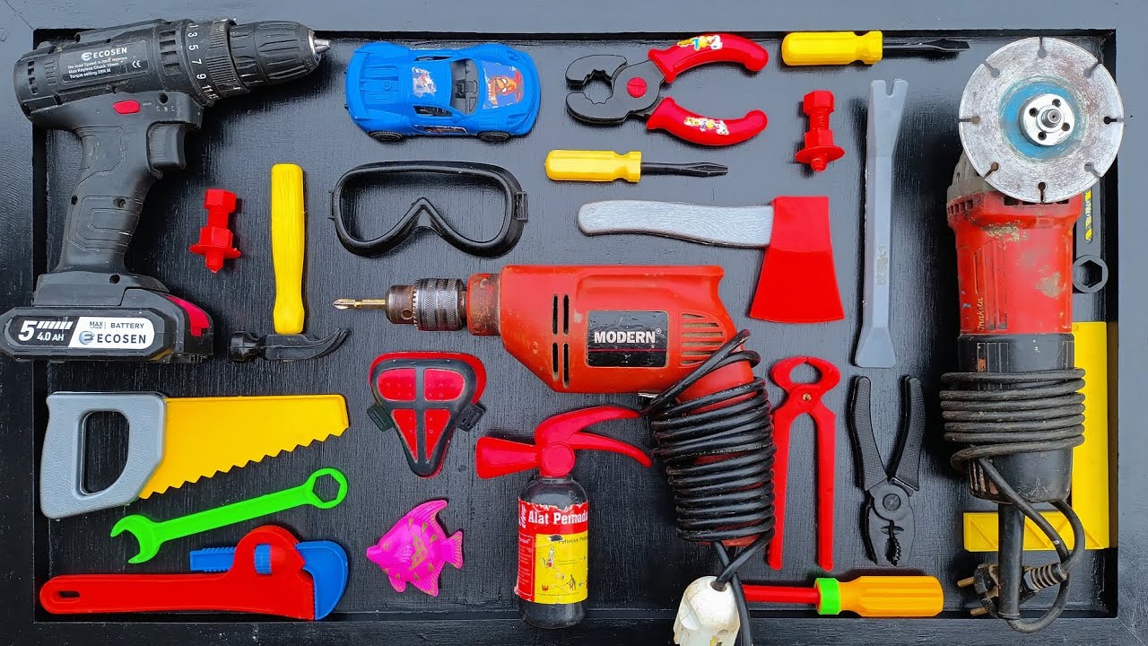 Collection of Repair Tools, Electric Drill, Electric Saw, Hammer With Wriench, Pliers, Hacksaw