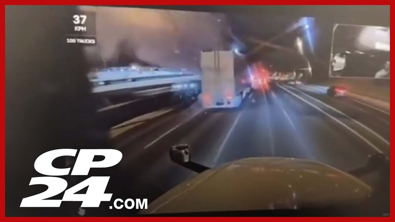 Vehicle flies off Hwy. 427 overpass and onto Hwy. 401, sending two people to hospital