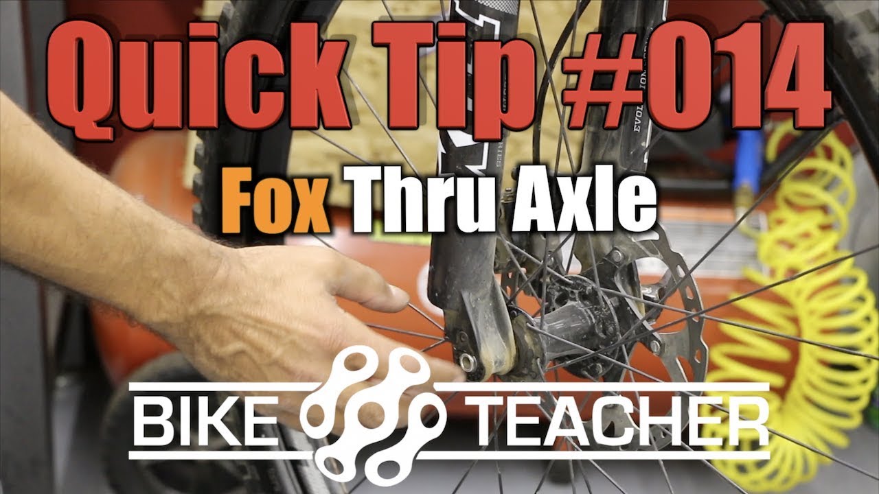 How to adjust Fox fork thru axle, by turning the numbered dial.