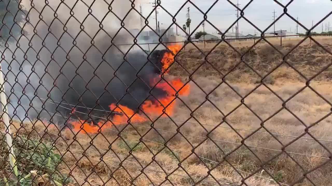 Fire crews battling vegetation fire