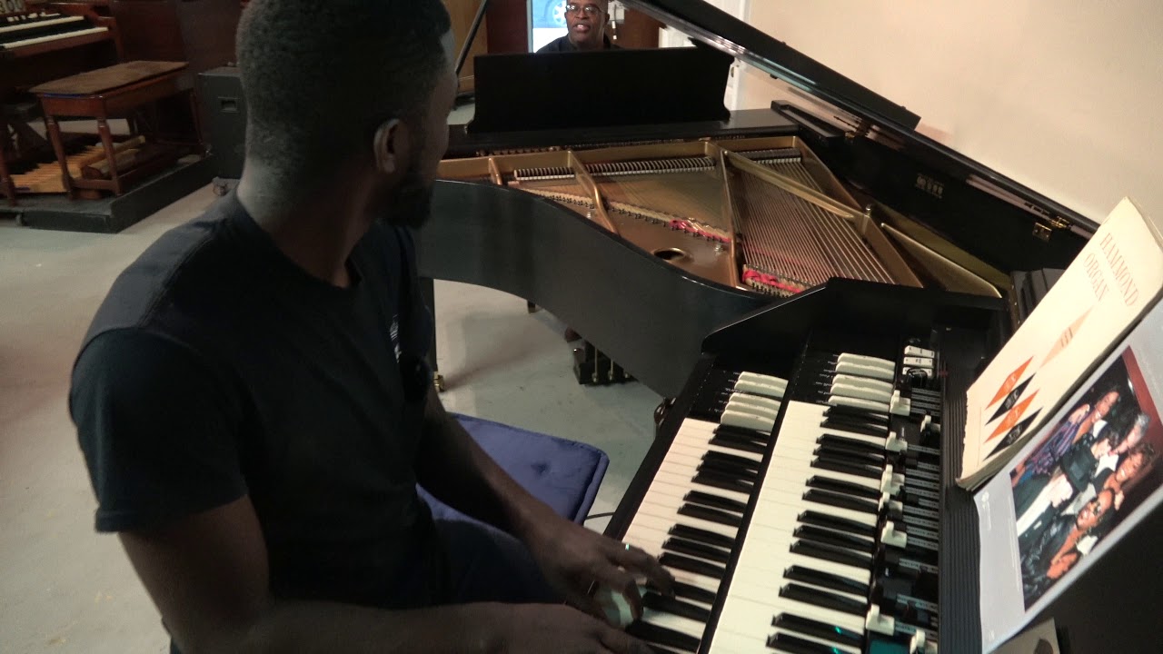(Leaning on the everlasting arms) Minister Jones at Keyboard Exchange