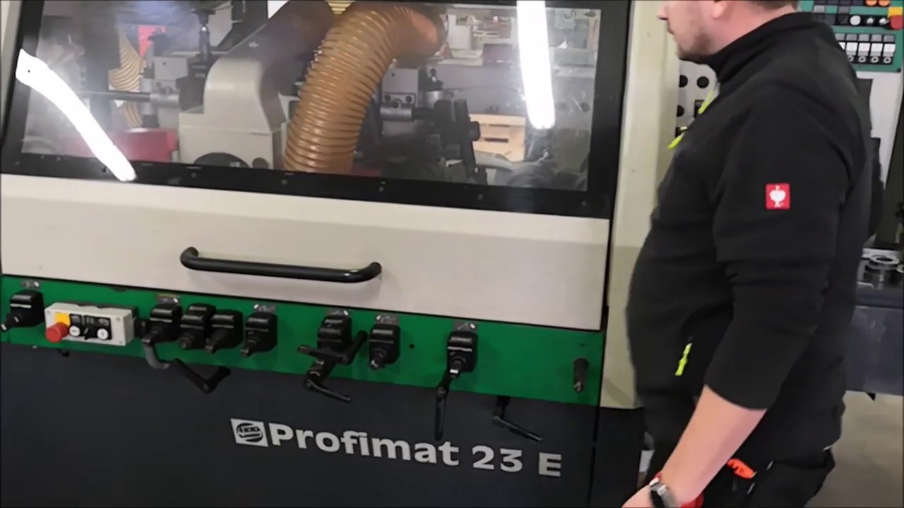 Vierseitenhobelmaschine WEINIG Typ Profimat 23 E