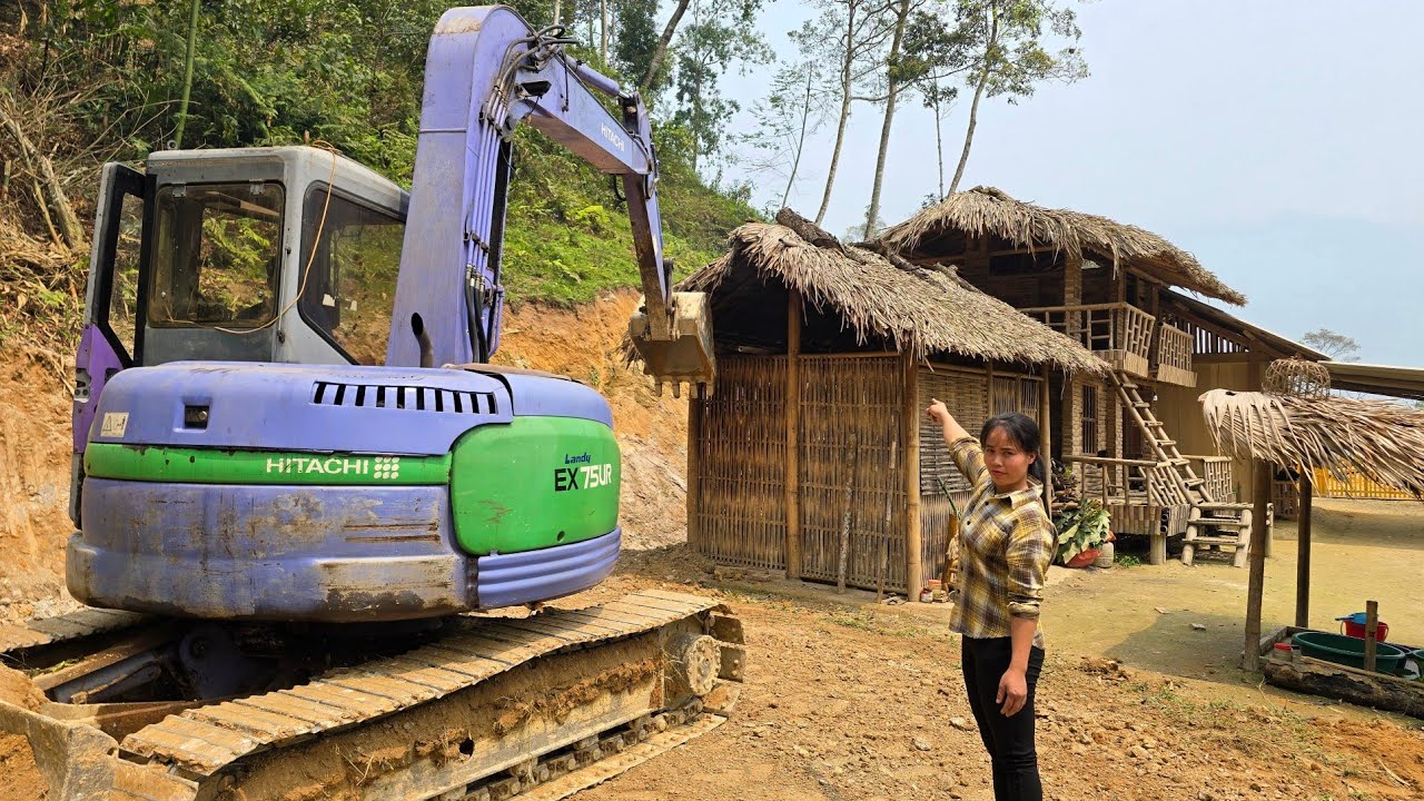 Woman hires excavator to expand around her home | Lý Thương country life