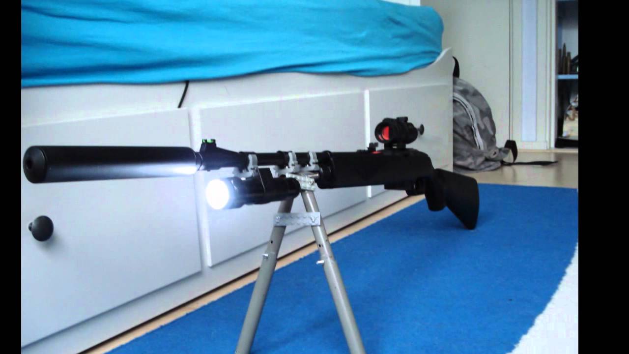 crosman 1077 with silencer and red-dot