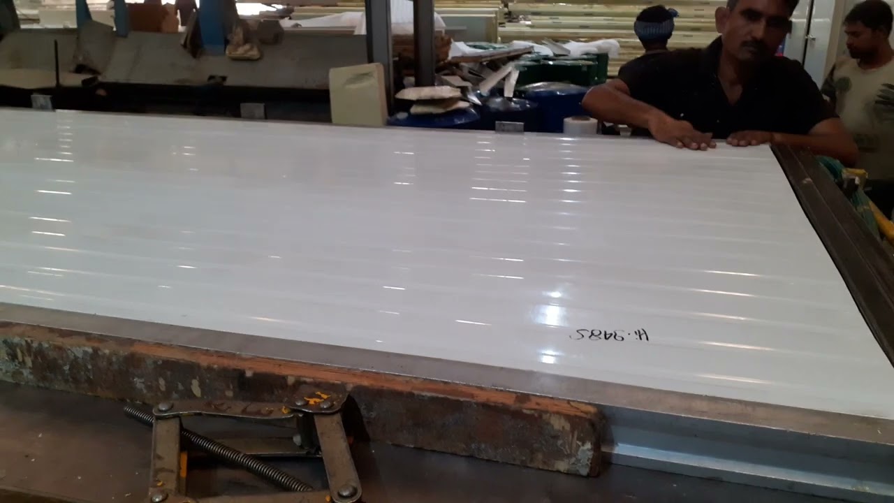the making process of sandwich puff panel (insulated panel).with use of stopper