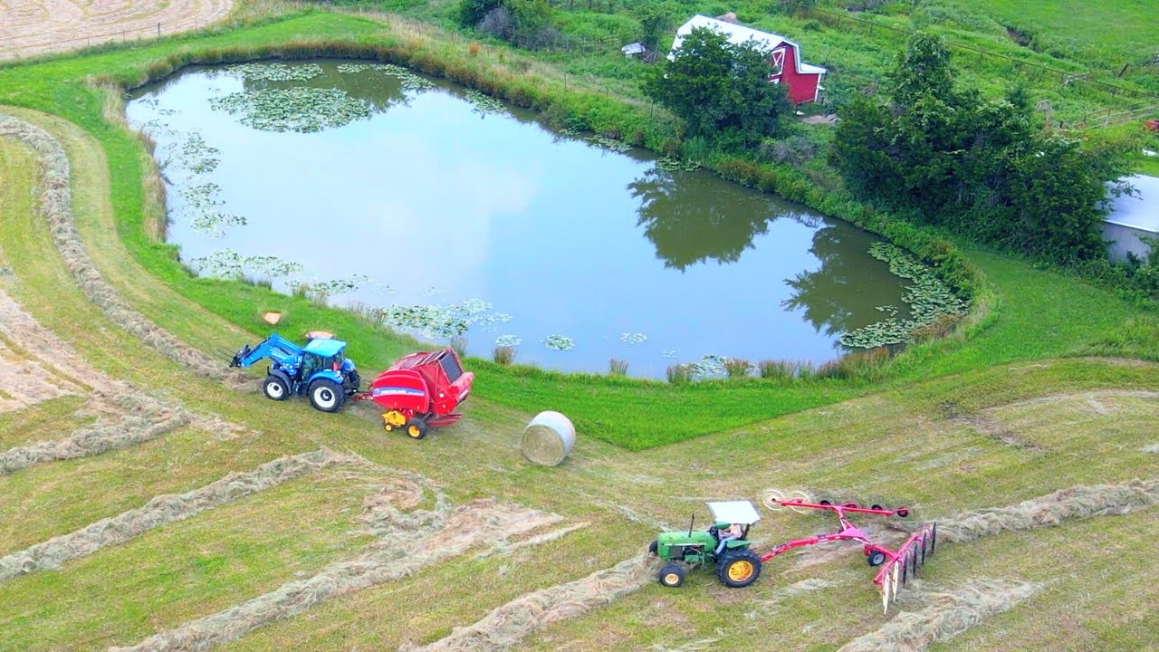Cutting, Raking, and Baling Hay - Case, New Holland, and a John Deere 2750