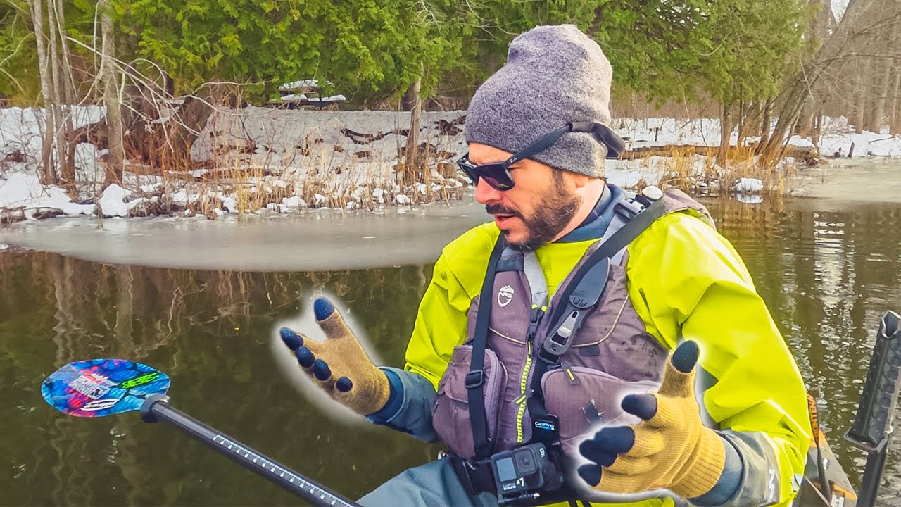Testing cold weather gloves while kayak fishing for musky