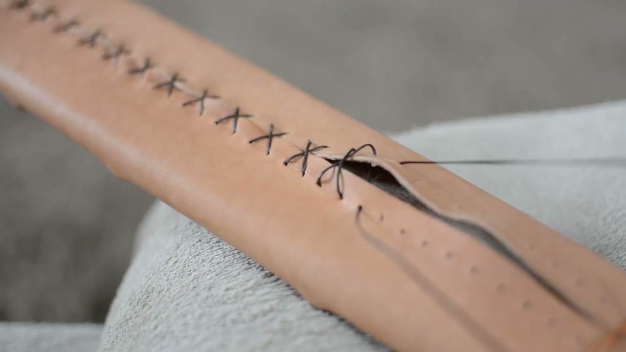 Leather work on the scabbard - medieval sword