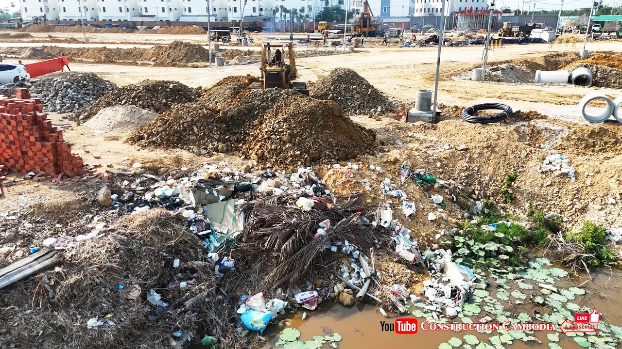 See How Experts Use Bulldozers & Dump Trucks to Clear Massive Landfill Areas