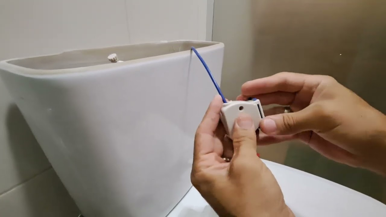 Solução na caixa acoplada do banheiro(Problema no botão de descarga)