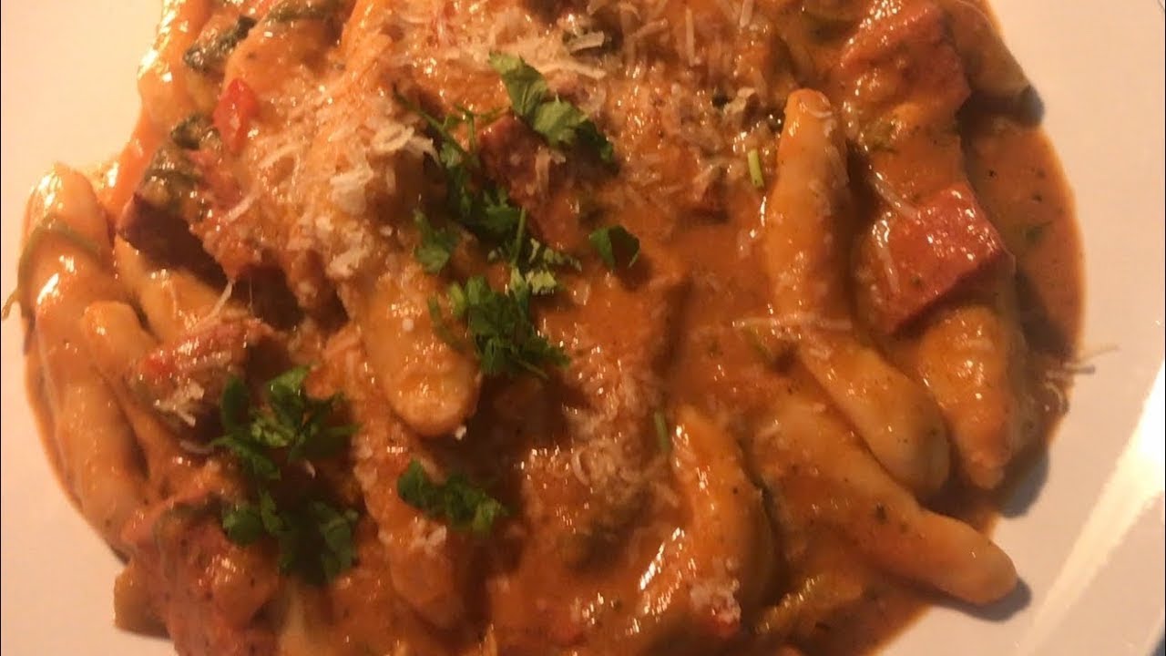 DOMINICAN DUMPLINGS WITH SALAMI GUISADO || COOKING WITH KMILLZ 👩🏻‍🍳🇩🇴
