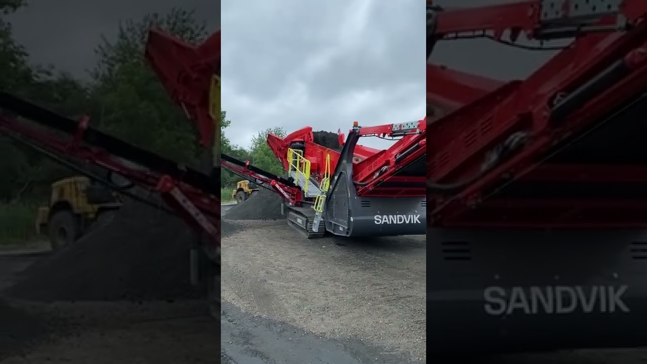 A Sandvik QE442 being fed with a 962 CAT Loader making 1-1/2