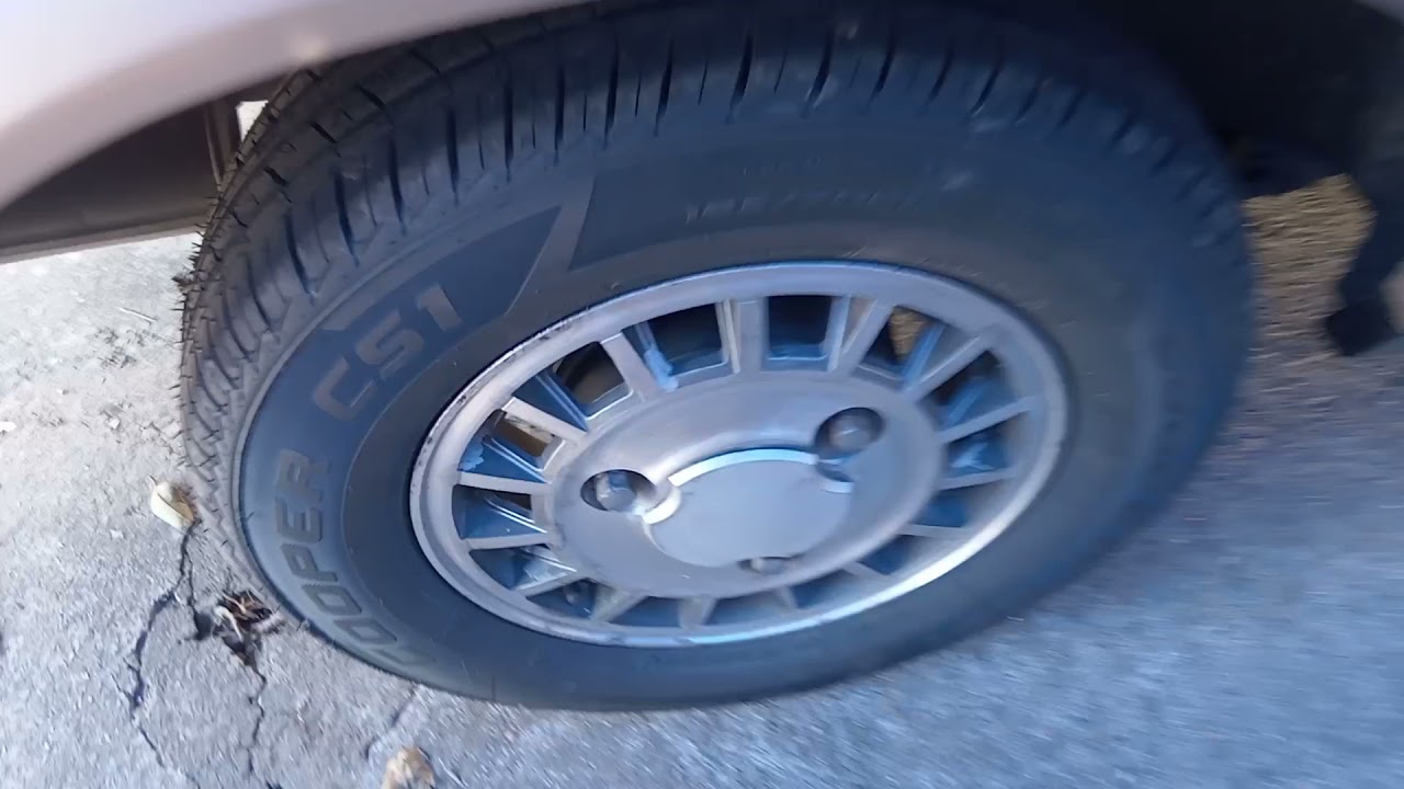 fiz uma cobertura improvisada e instalei os pneus 185/70/13