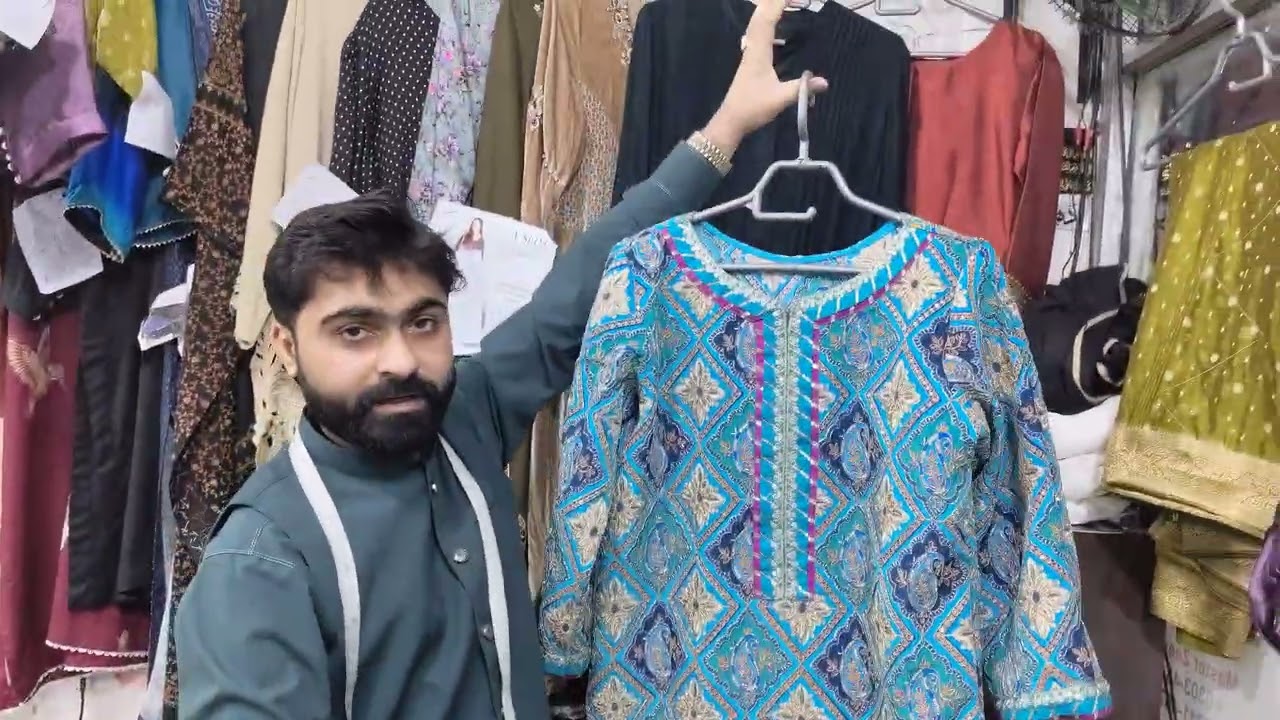 Zee National Tailor International market model town M block Mobil nbr 03034347903