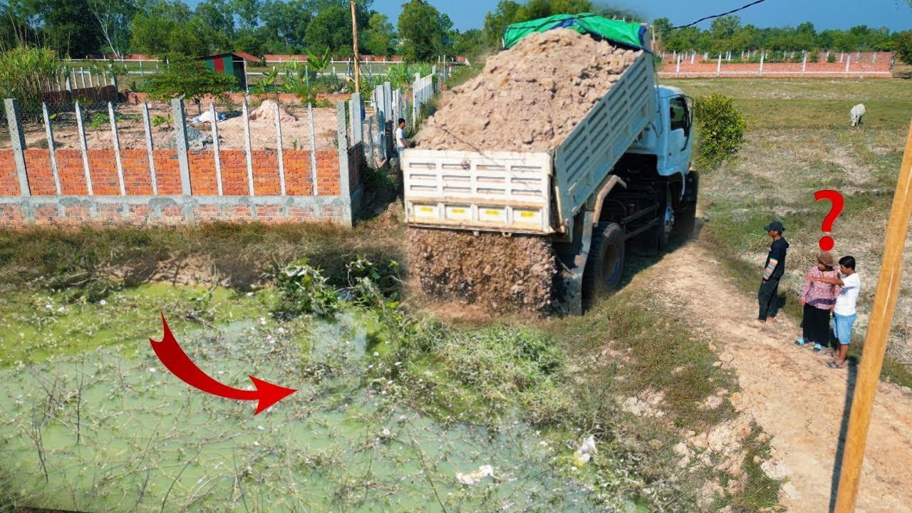 100% Completion Rapid Soil Filling in Flooded Village with Mini Dozer & Dump Trucks