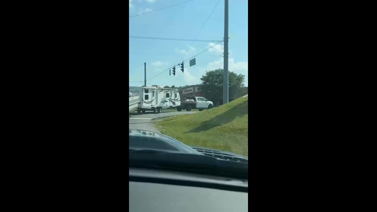 Tandem Towing in the Wild - A Boat Behind a Travel Trailer RV