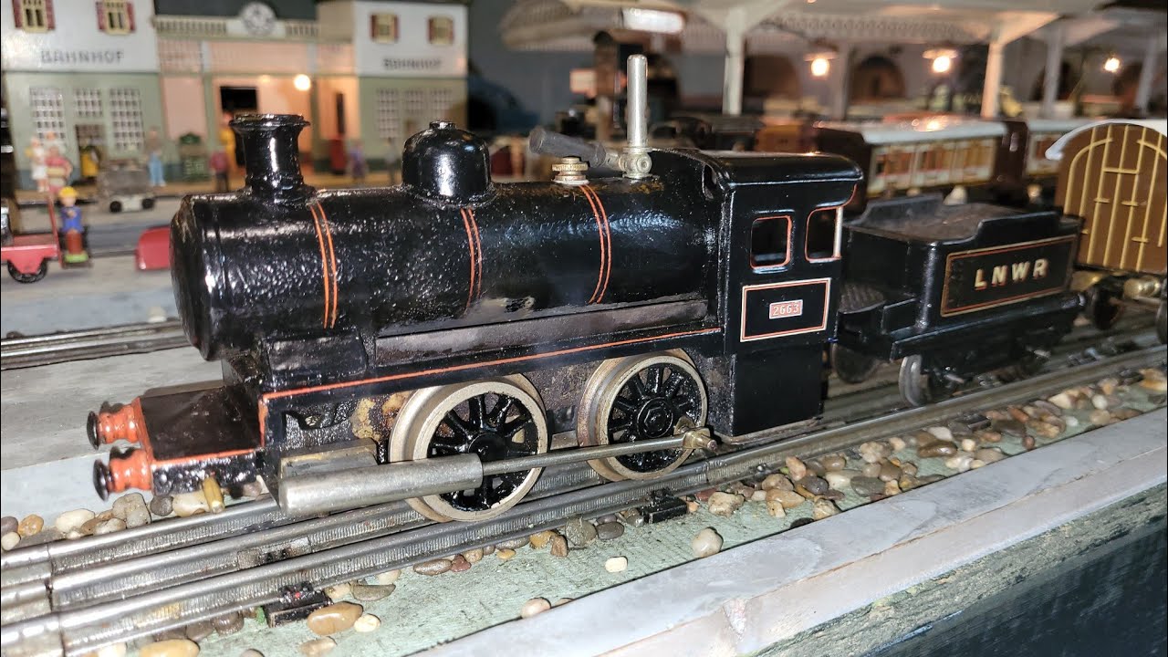 Vintage Bing 0 gauge livesteam locomotives for English market (and small crash)