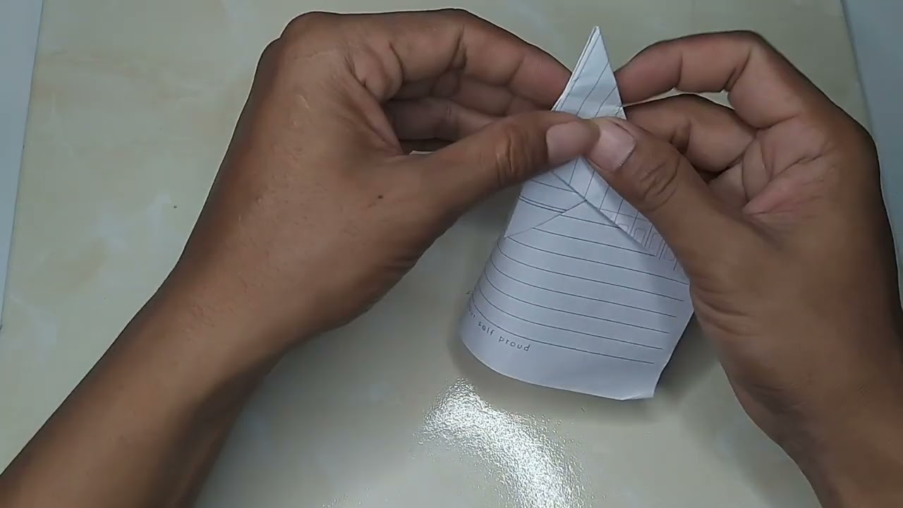 Membuat pesawat kertas bomerang bisa muter