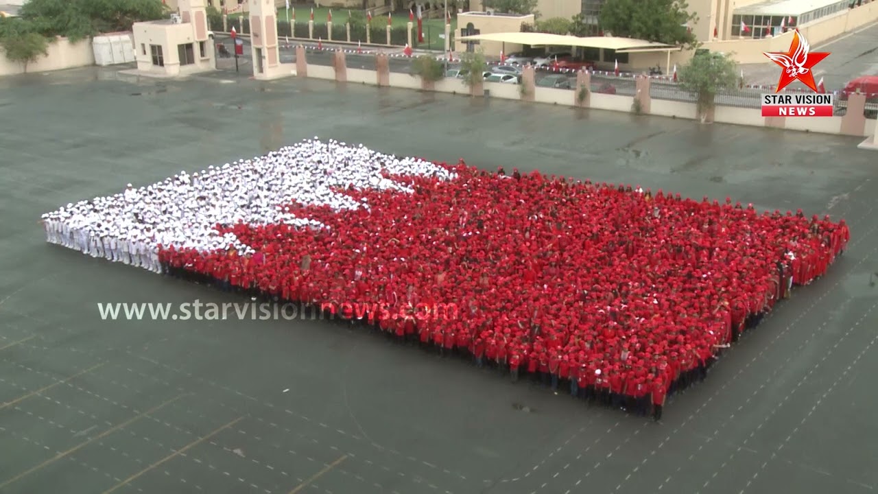 Most people saluting the national flag simultaneously  | Indian School Bahrain
