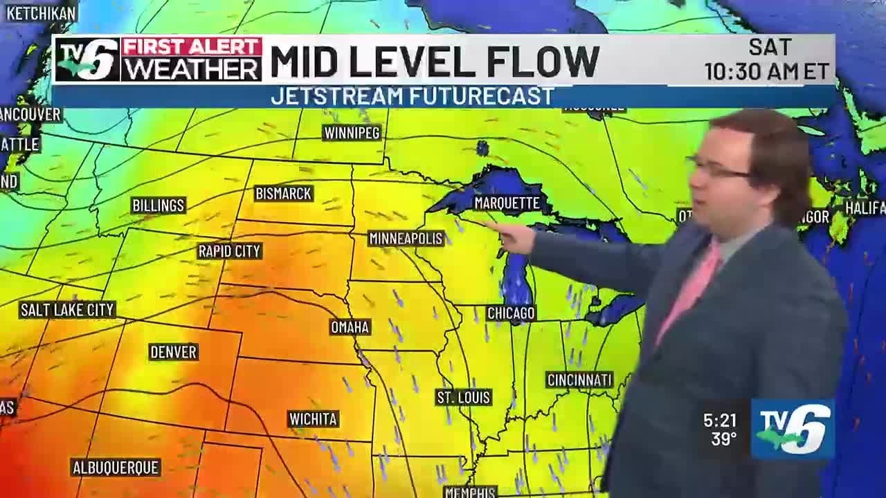 Spotty rain and snow with warming trend