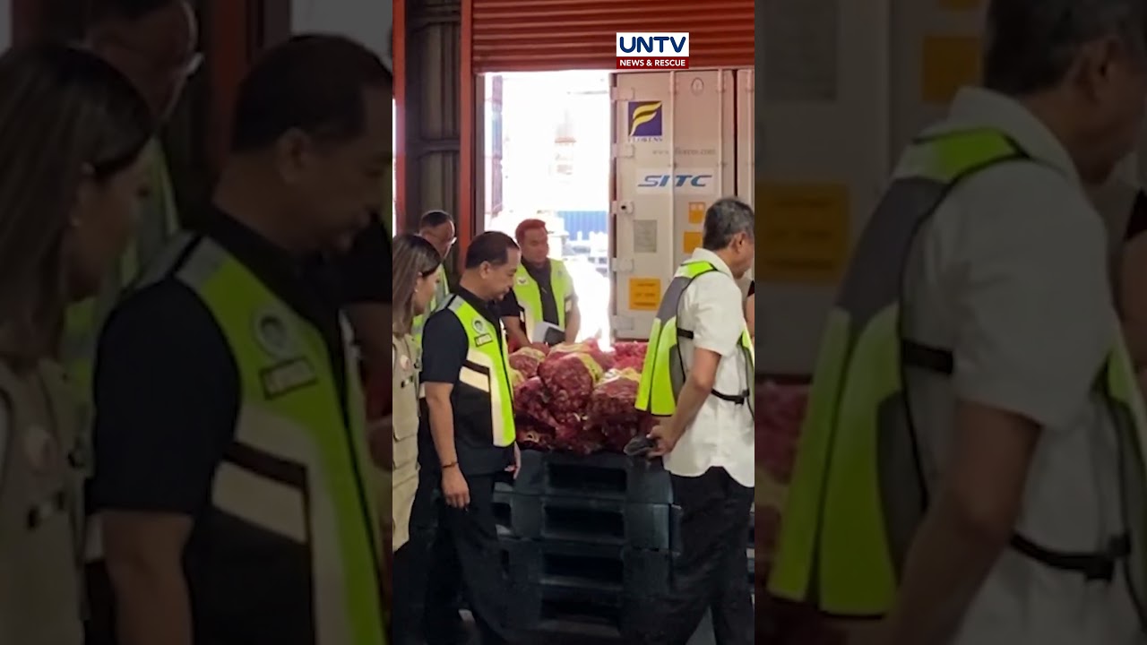 Government officials inspect 26 containers of imported onions from China worth over ₱36 million