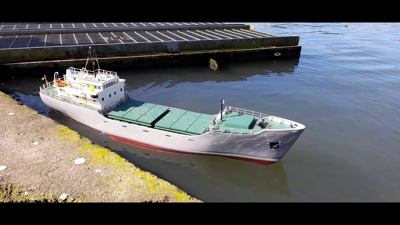Rc cargo ship Lucienne, in & out of the harbour practice manoeuvres.