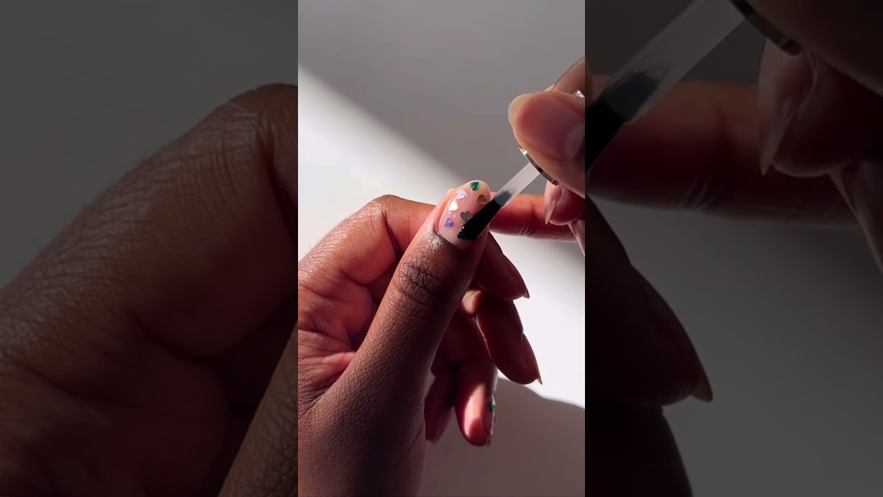 The #nailsinc 'Love In Sequins' Topper is the polish missing in your #pride  mani! #nailart