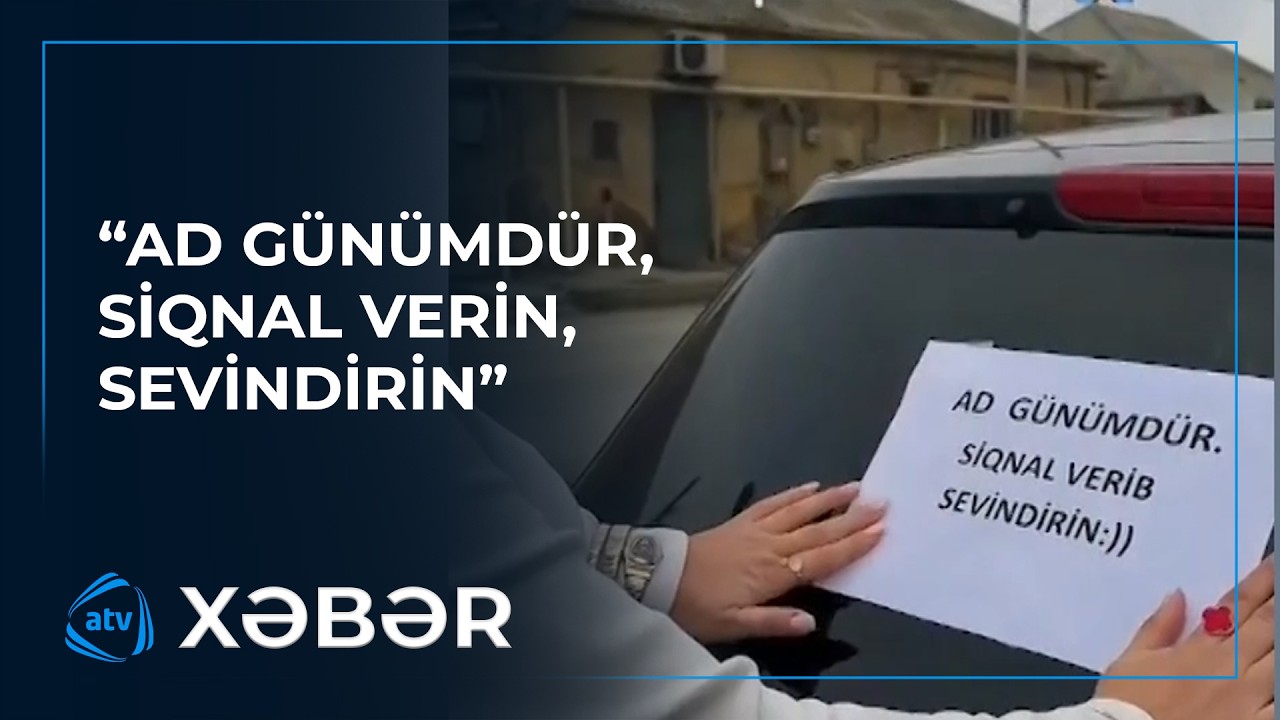 Xanım sürücü avtomobilin arxa şüşəsinə ad gününün olduğunu yazıb