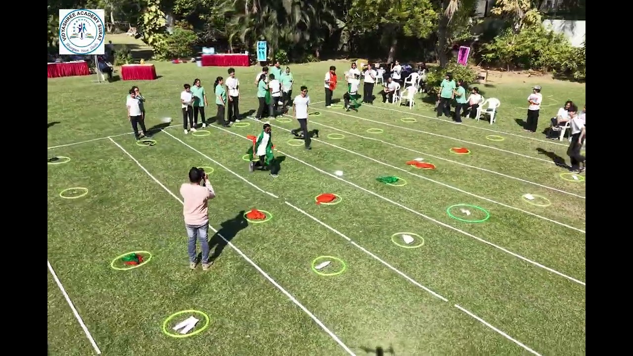 Students participate in races, games, and drills, building teamwork.