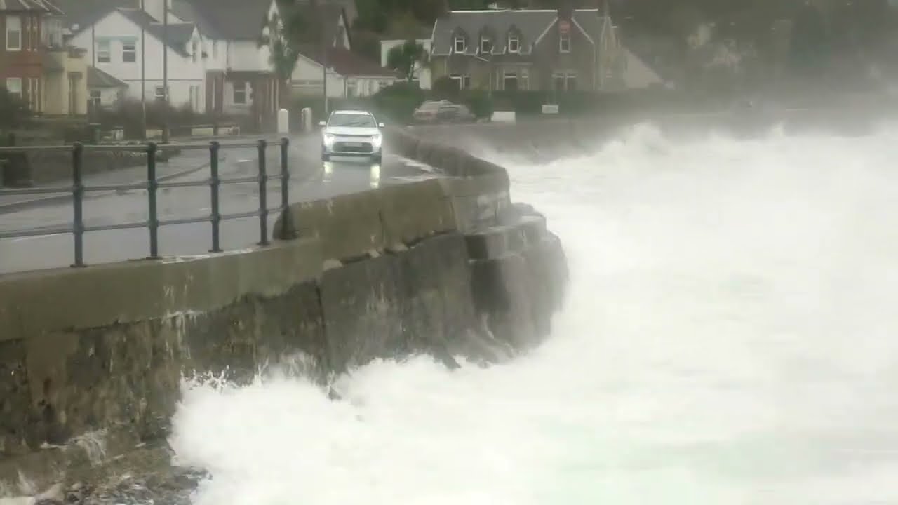Storm Babet waves crashing over sea wall Whiting Bay Isle of Arran@davetheraverovingtherock