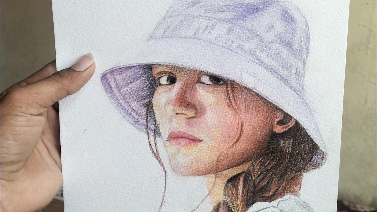 i never thought I could draw it .....i drew a portrait with colour pencils first time