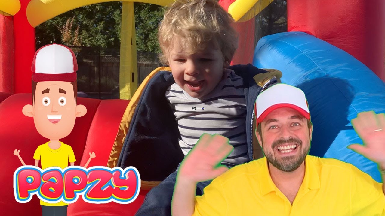 Papzy and Ryan jump in a bounce house educational video for toddlers with jump song