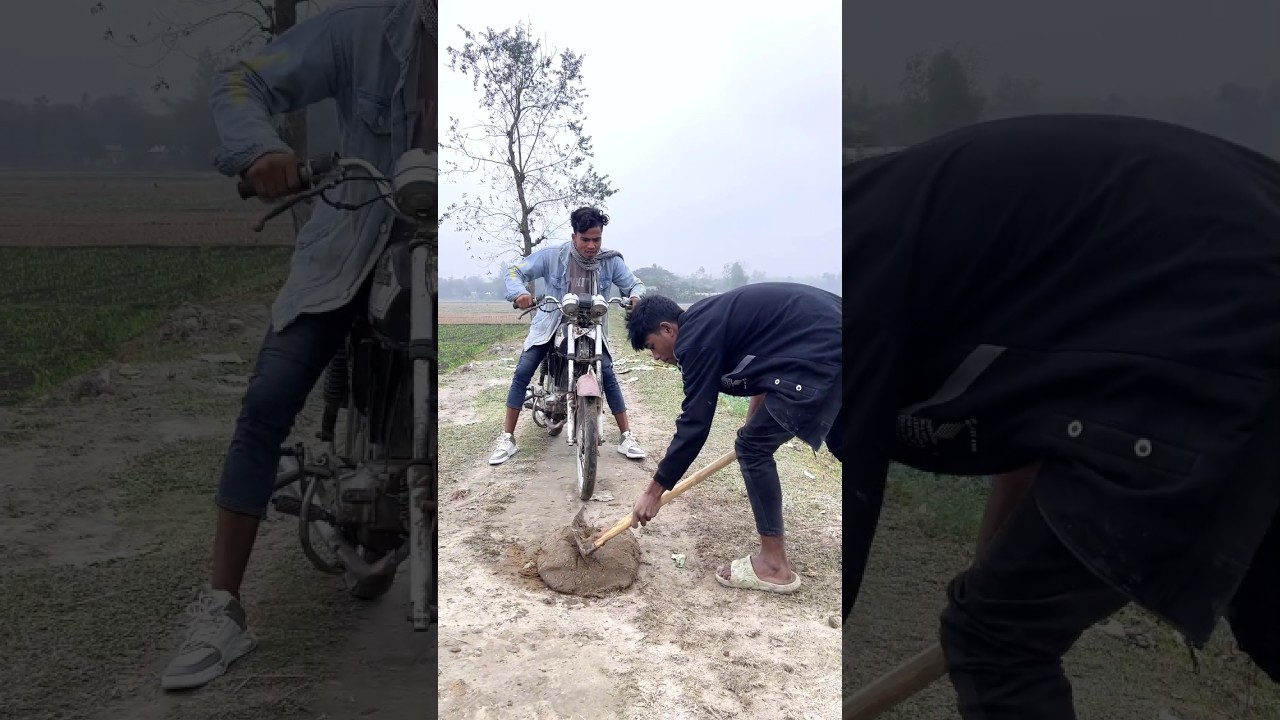 Двое мальчиков разрезали черный торт посреди улицы.