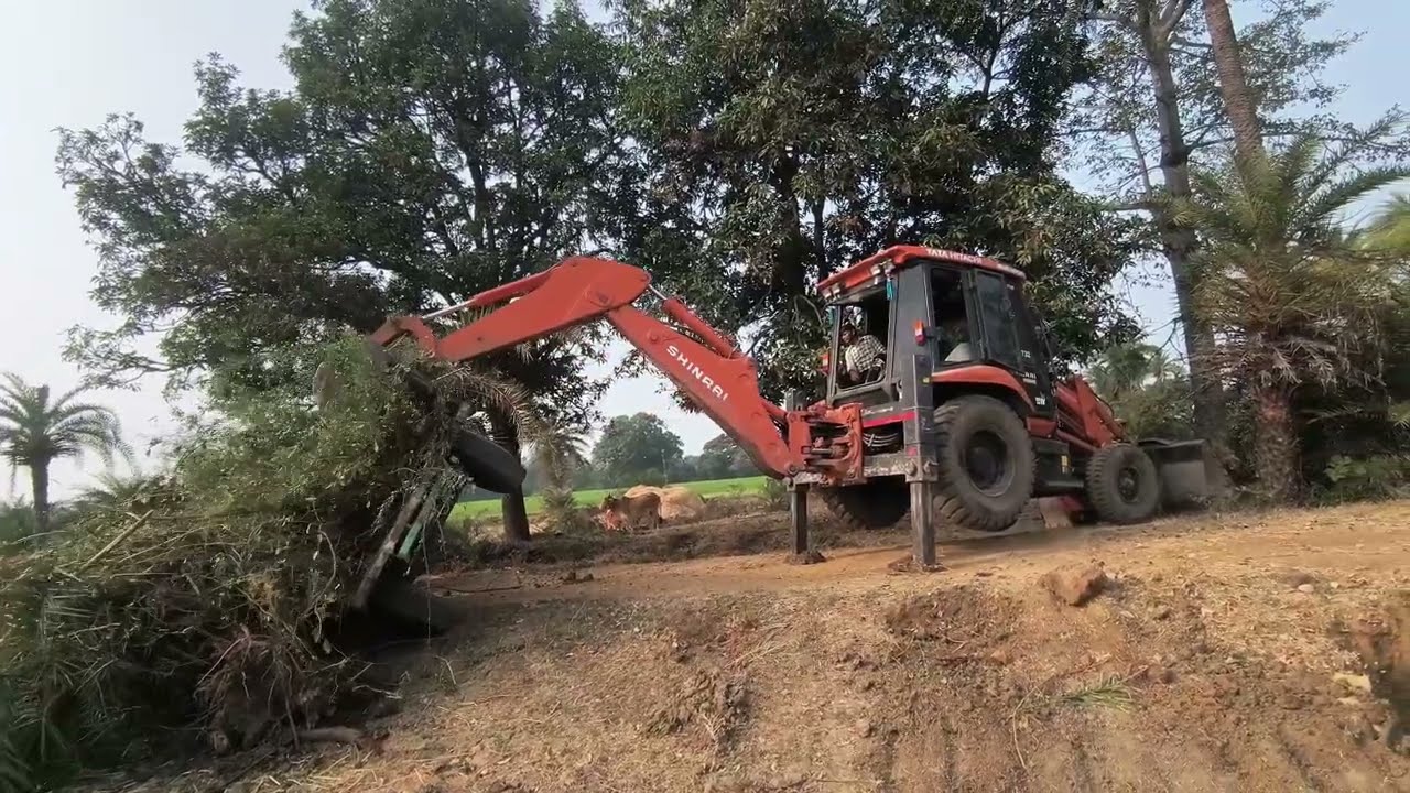 overturned trolley was lifted by a JCB | palti tiroli ko jcb se uthaya |