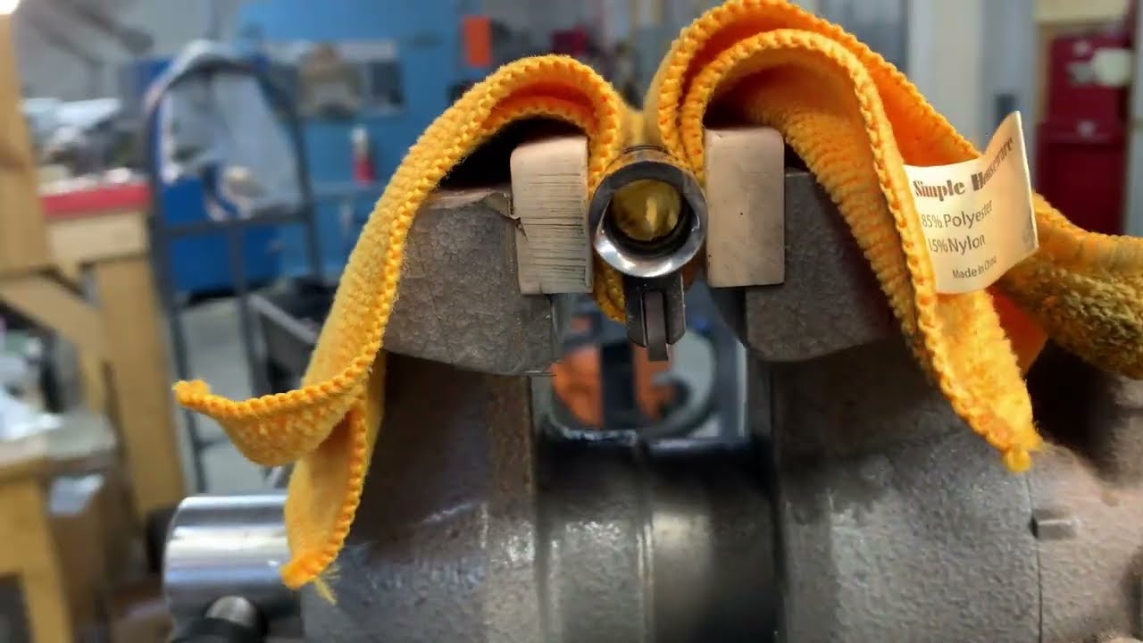 Custom 1911 building: Final polish feed ramp and barrel throat