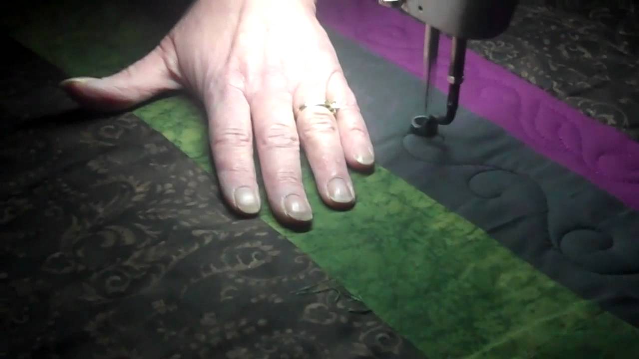 Free Form Long Arm Quilting, "curley  cue" border fill