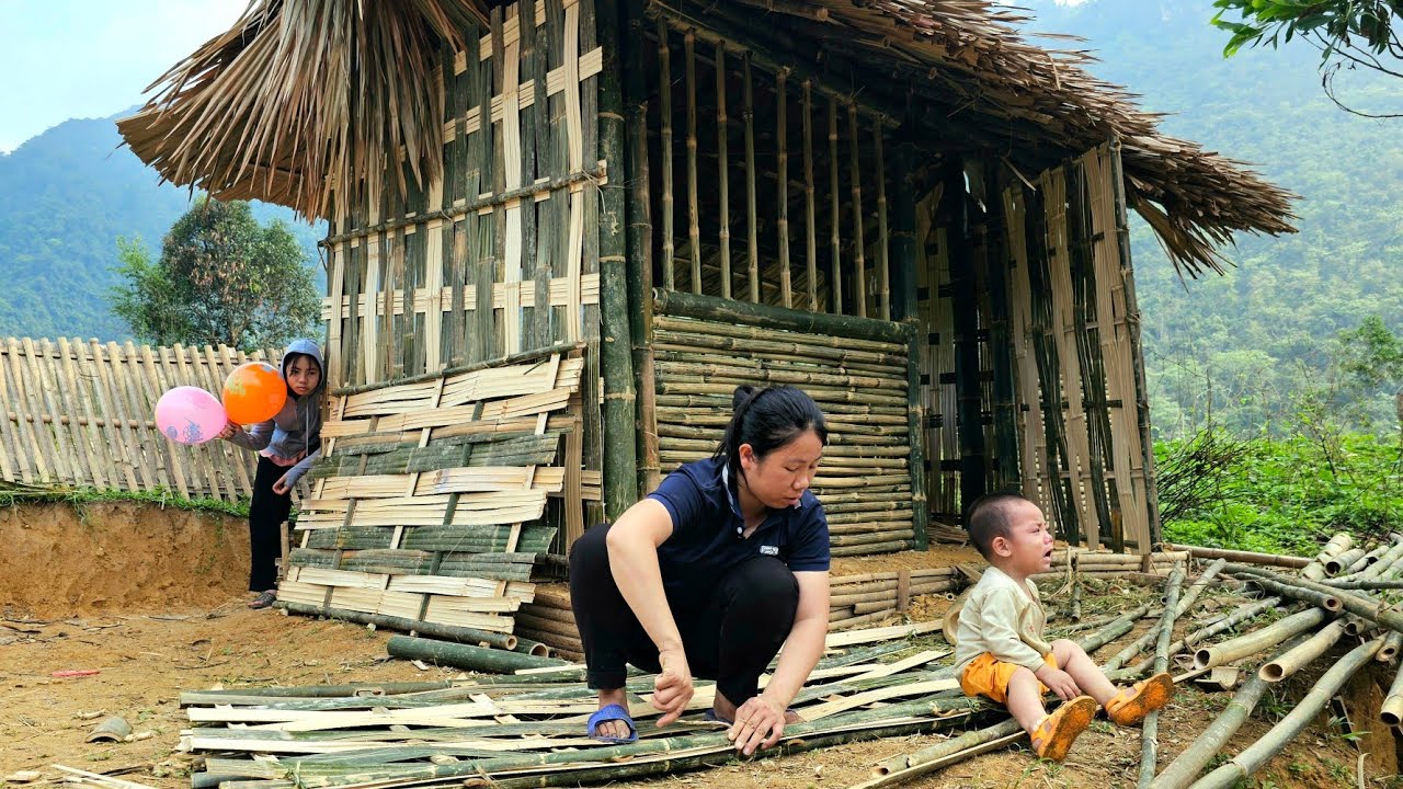 Homeless mother and son complete bamboo house windows and the mysterious person giving the gift