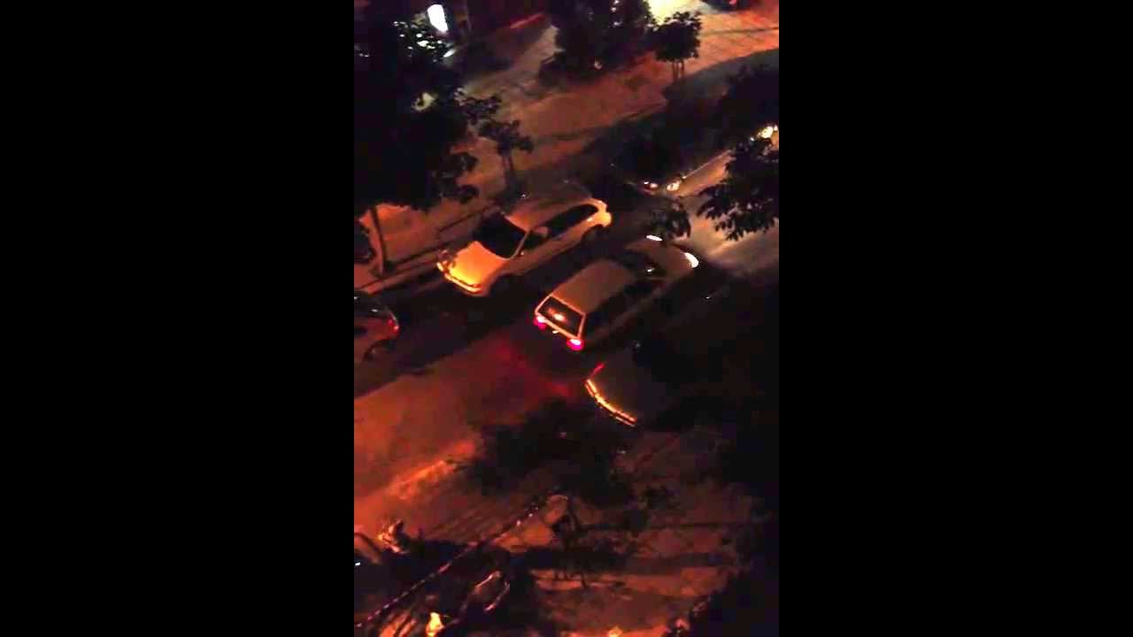 A woman tries to park